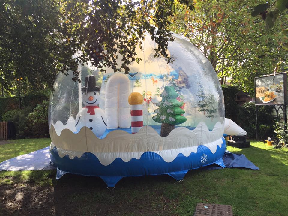 An image of one of SJ's Leisure's inflatable snow globes